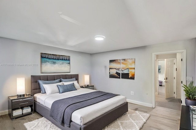 bedroom featuring light hardwood / wood-style flooring