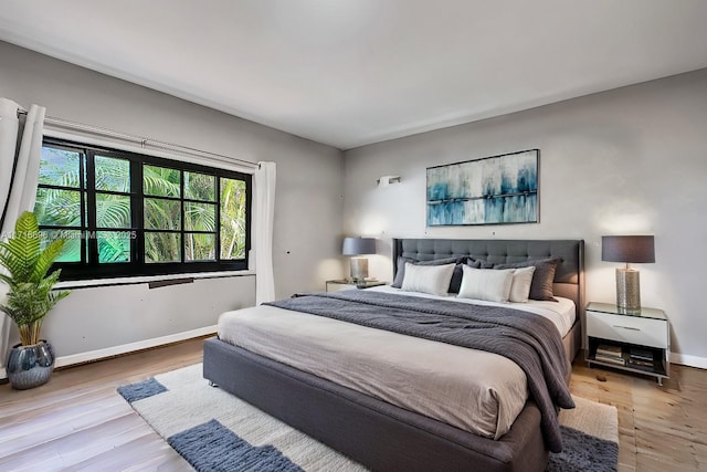 bedroom with light hardwood / wood-style floors