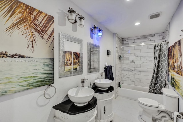 full bathroom with shower / bath combination with curtain, vanity, toilet, and tile patterned flooring