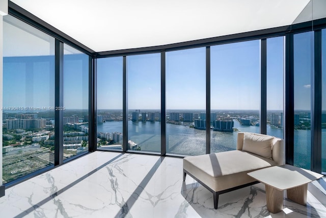 18555 Collins Ave Unit 4203, Sunny Isles Beach, FL 33160 - sunroom / solarium with a water view and a view of city