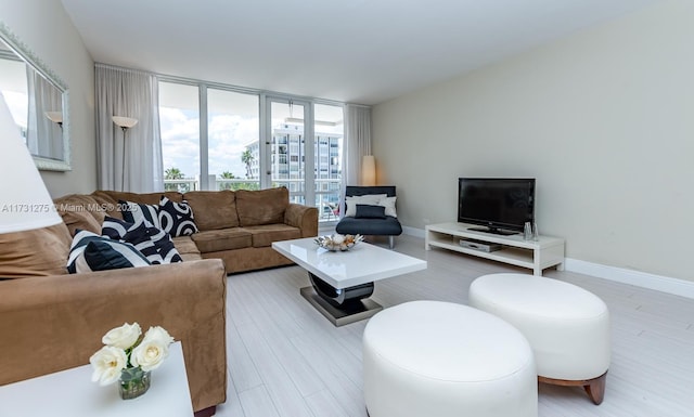 living room with light hardwood / wood-style floors