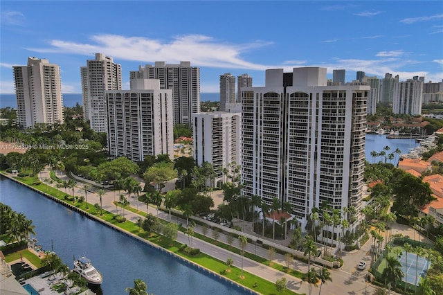 birds eye view of property featuring a water view