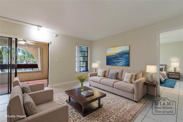 living room with tile patterned floors