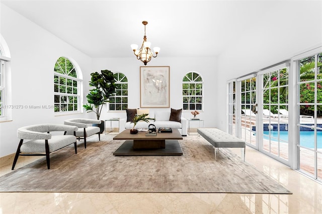 living room featuring a chandelier