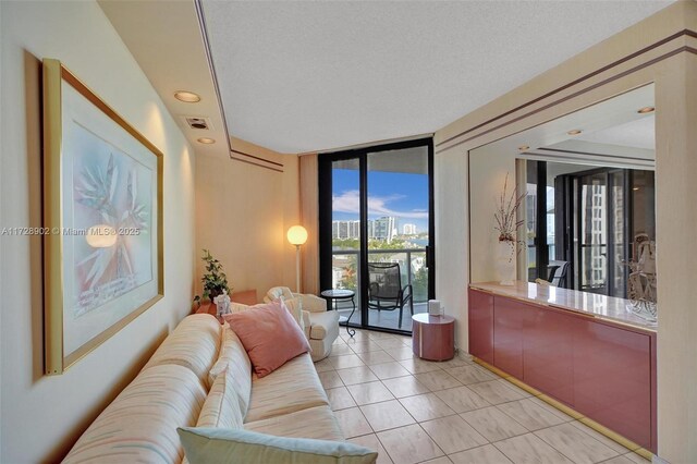 tiled living room with a textured ceiling