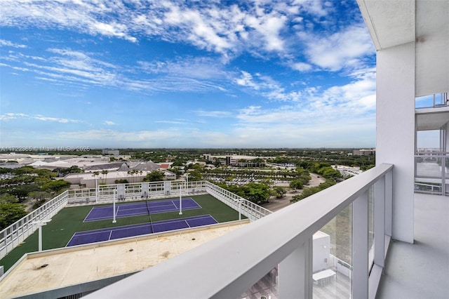 balcony featuring tennis court