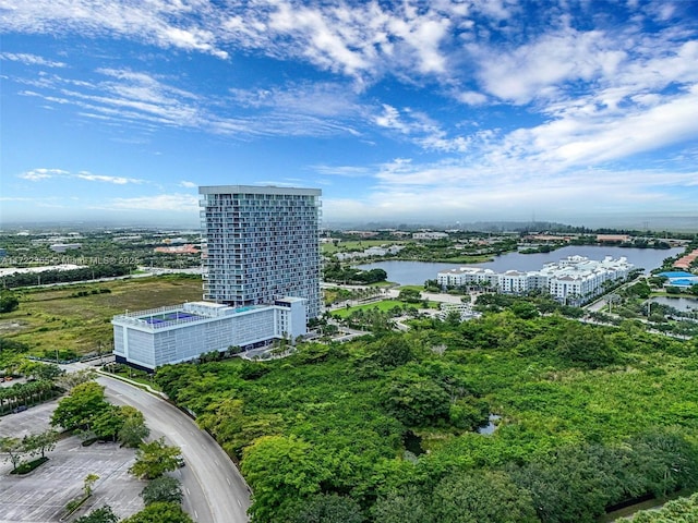 birds eye view of property with a water view