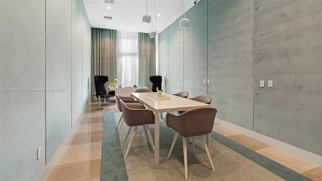 dining space featuring visible vents and recessed lighting