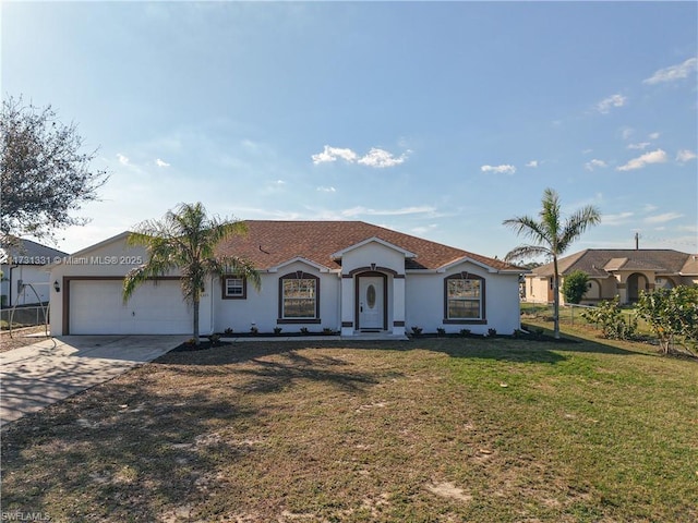 view of front facade featuring a garage and a front lawn