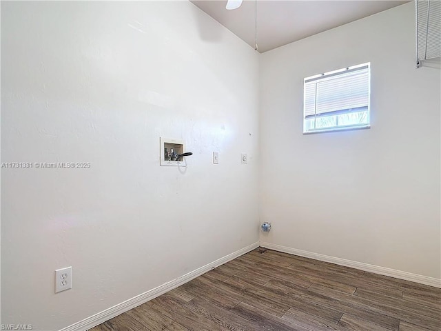 washroom with hookup for a washing machine, electric dryer hookup, and dark wood-type flooring