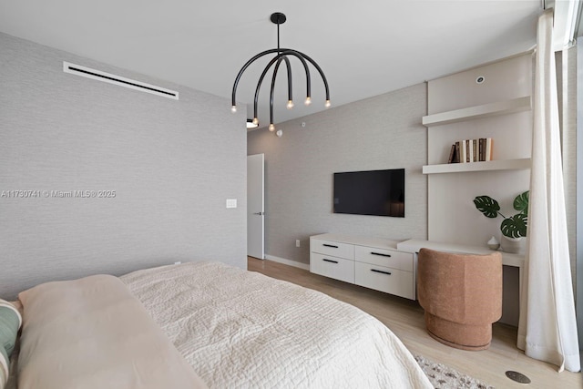 bedroom featuring light hardwood / wood-style floors