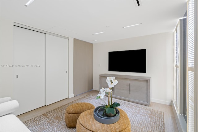 living area with wood finished floors