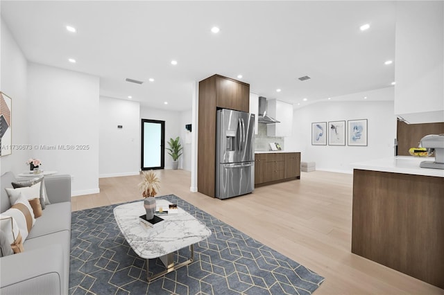 living room with light hardwood / wood-style flooring