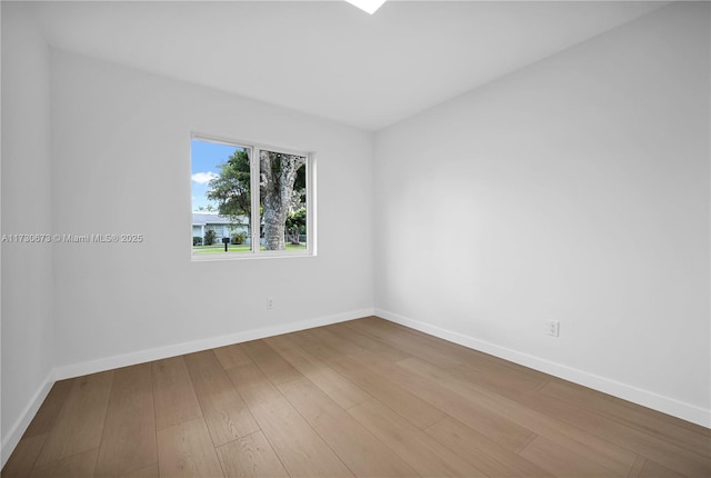 unfurnished room featuring wood-type flooring