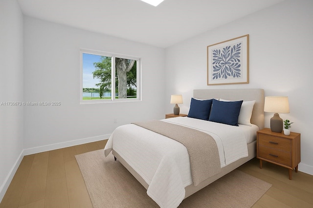 8745 SW 175th St, Palmetto Bay, FL 33157 - bedroom featuring wood finished floors and baseboards