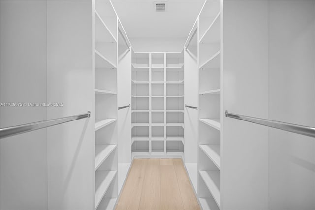 8745 SW 175th St, Palmetto Bay, FL 33157 - spacious closet with light wood finished floors