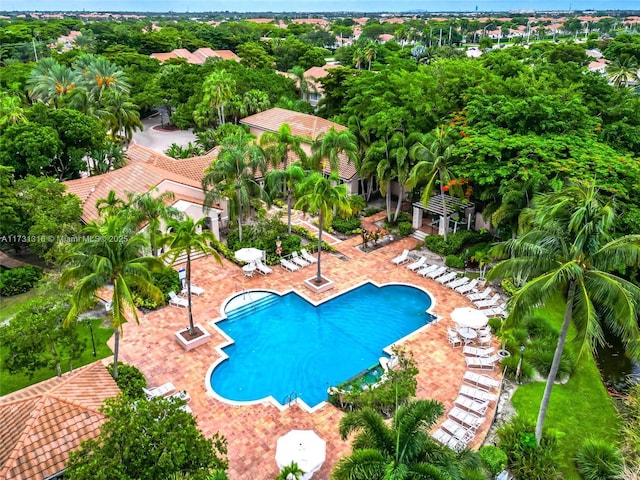 community pool featuring a patio area