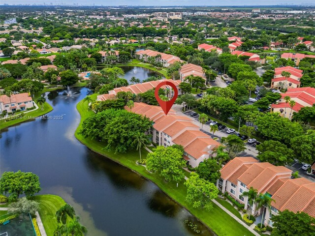 drone / aerial view with a water view