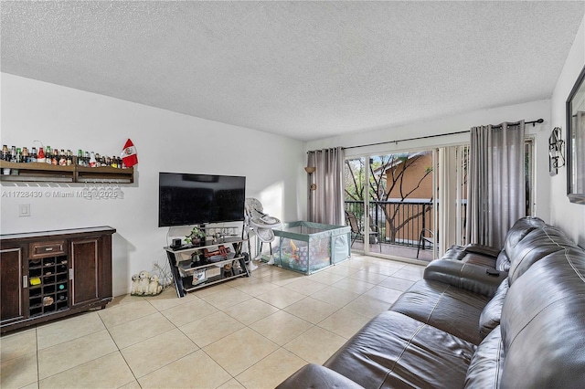 tiled living room with a textured ceiling