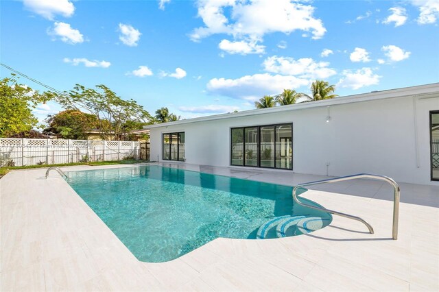 view of pool with a patio