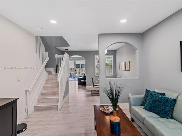 living room with light hardwood / wood-style flooring