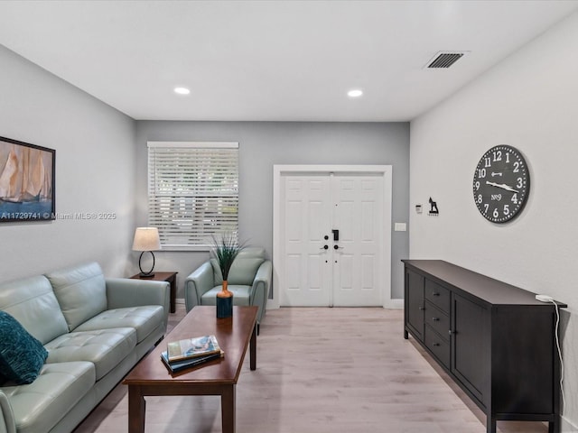 living room featuring light hardwood / wood-style flooring