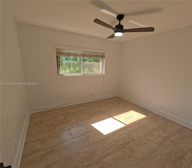 unfurnished room with ceiling fan