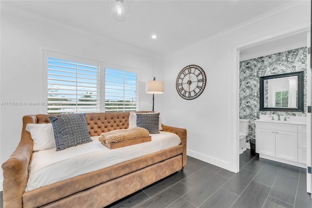 living area featuring crown molding and sink