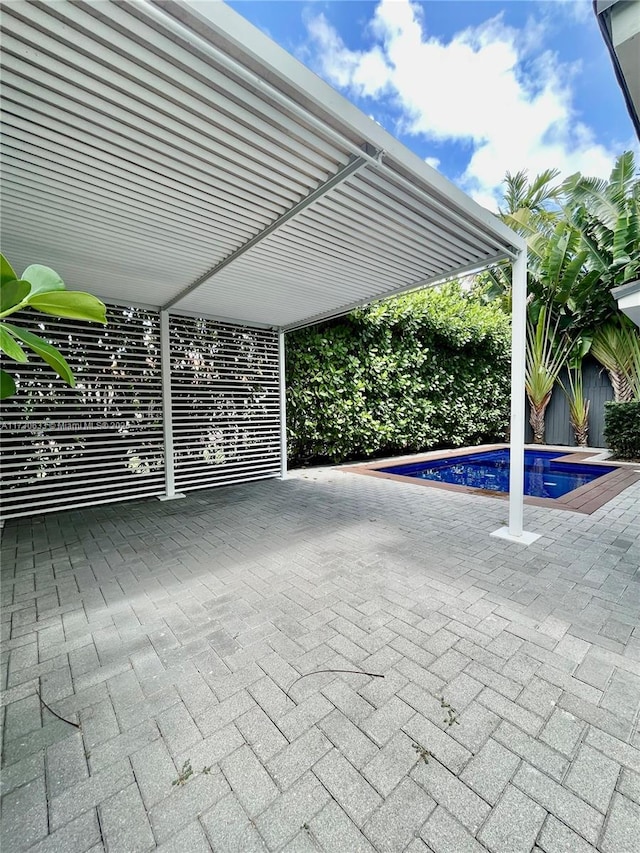 view of patio with a fenced backyard and a fenced in pool