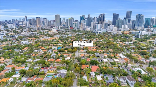 birds eye view of property with a city view