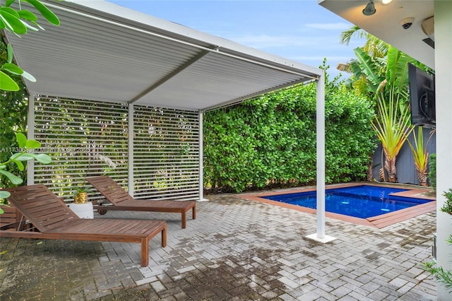 pool featuring a patio area