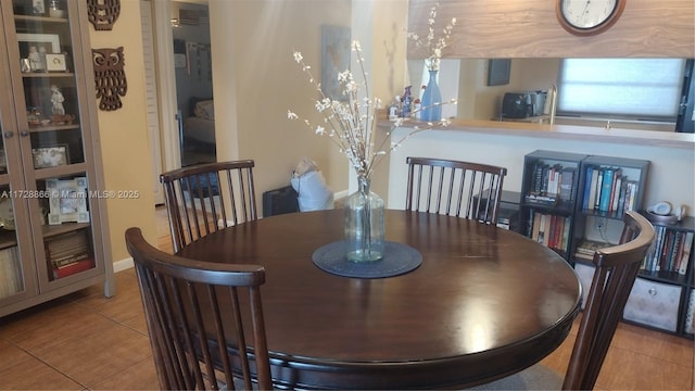 dining room with tile patterned floors