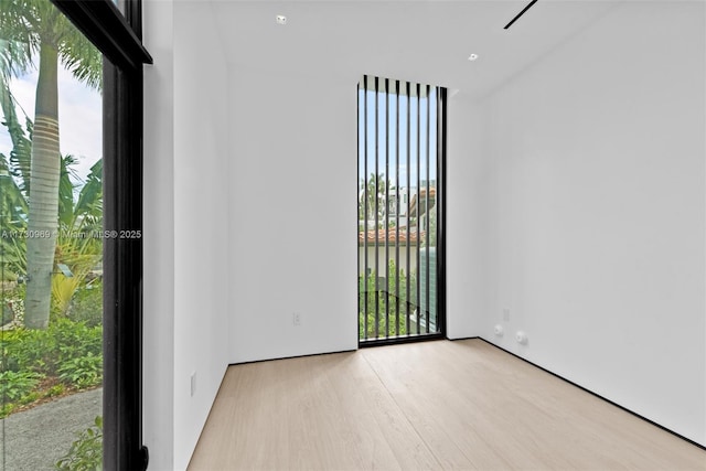 291 Palm Ave, Miami Beach, FL 33139 - spare room featuring light wood-style flooring and recessed lighting