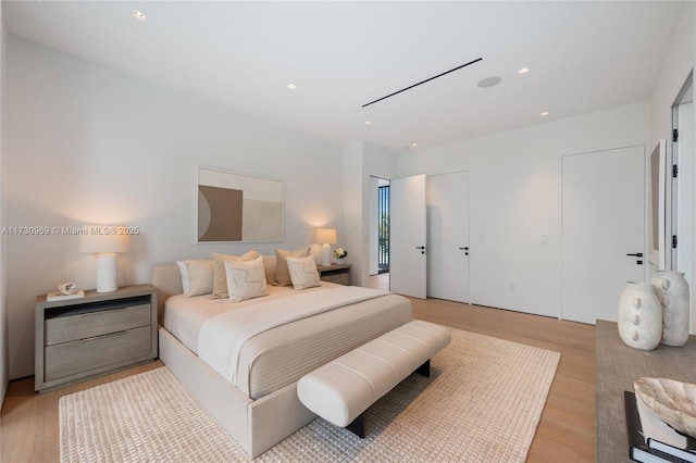 291 Palm Ave, Miami Beach, FL 33139 - bedroom featuring light wood-style floors and recessed lighting