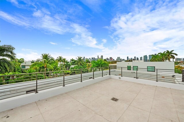 view of patio / terrace with a balcony