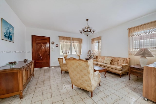 living room with an inviting chandelier and light tile patterned flooring