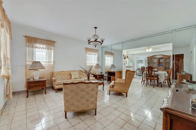 tiled living room with a chandelier