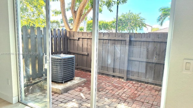 view of patio with central AC unit