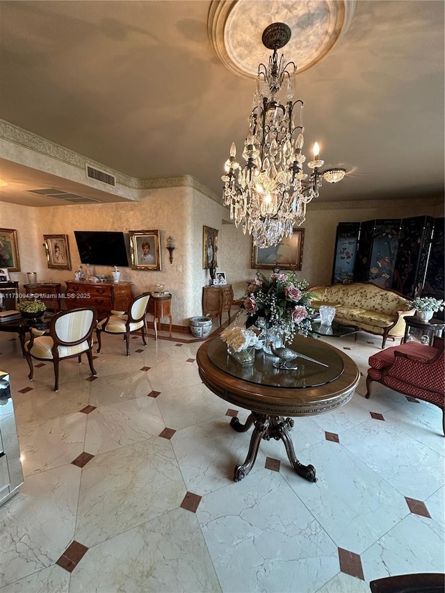 dining room with an inviting chandelier and crown molding