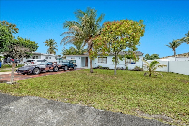 view of front of home with a front yard