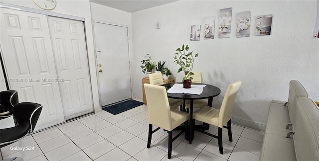 view of tiled dining space