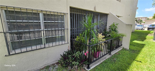 view of property exterior featuring a yard