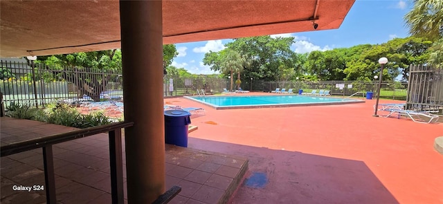 view of pool with a patio area