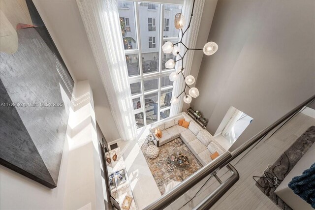 living room with an inviting chandelier