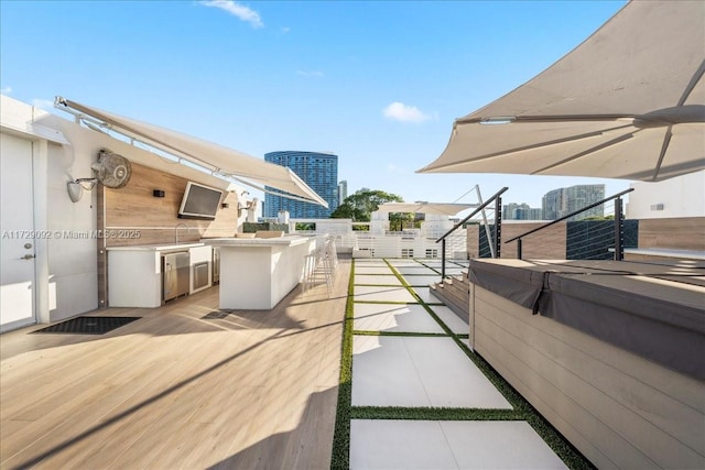 exterior space featuring an outdoor kitchen