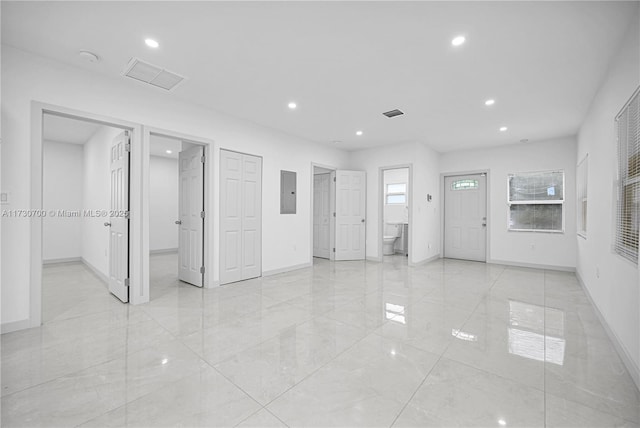 interior space featuring plenty of natural light and electric panel