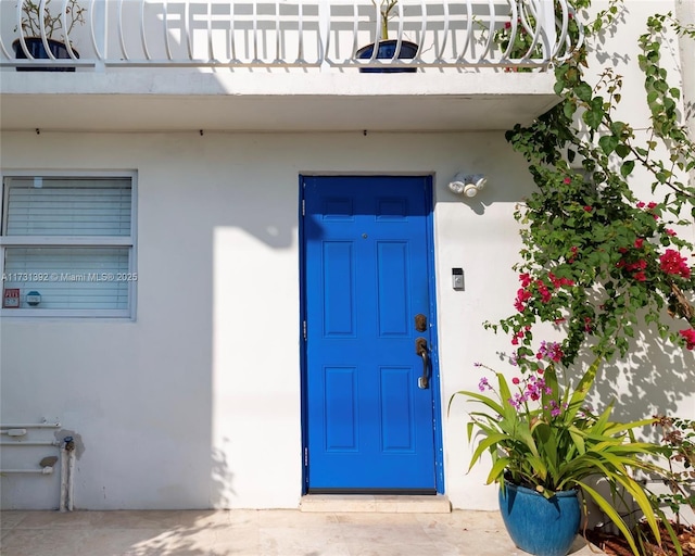 2035 NE 123rd St, North Miami, FL 33181 - property entrance featuring stucco siding