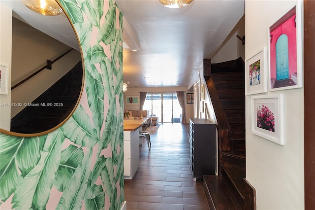 2035 NE 123rd St, North Miami, FL 33181 - corridor with stairs and dark wood-style floors