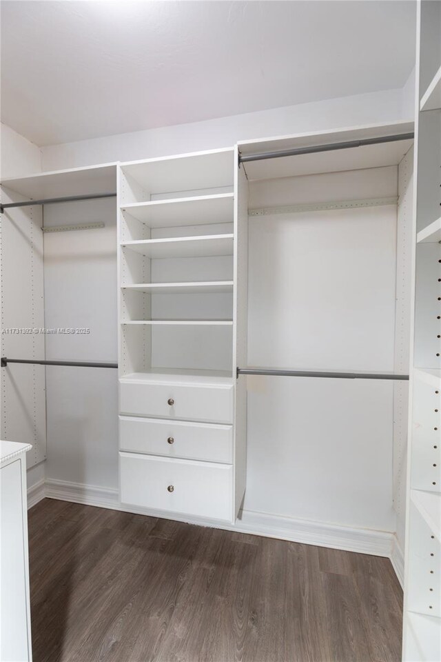 2035 NE 123rd St, North Miami, FL 33181 - spacious closet with dark wood-style floors
