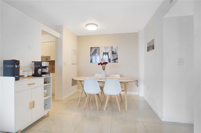 tiled dining room with breakfast area